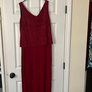 Red sparkled maxi dress.  Size 12.  Crepe like stretch fabric. Slip on.